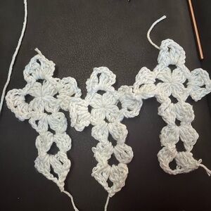 These are crochet crosses you can hang in your car use as a bookmark etc.(: